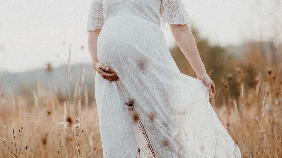 Pregnant Woman in a Field
