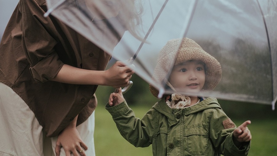 Little Girl in the Rain