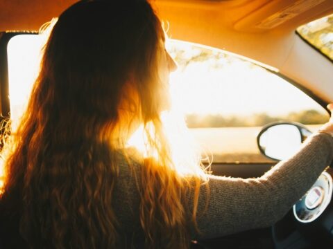 Girl Driving a Car