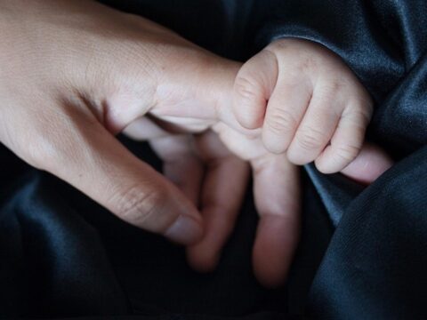 Baby Holding a Finger