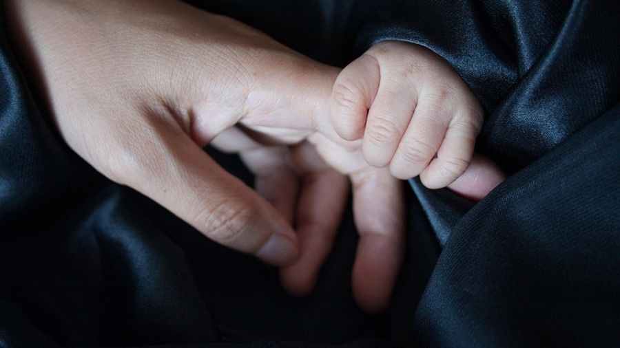 Baby Holding a Finger