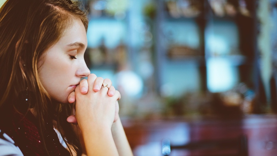 Girl Clasping Her Hands