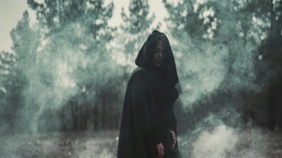 Hooded Figure in the Woods