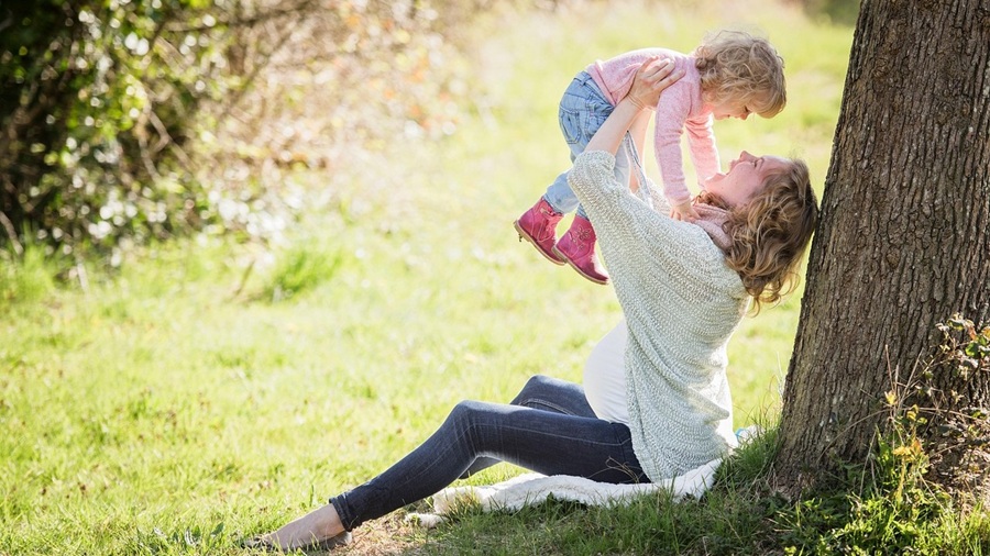 Mom Playing with Little Girl